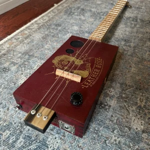 3-String Leather Rose Guitar