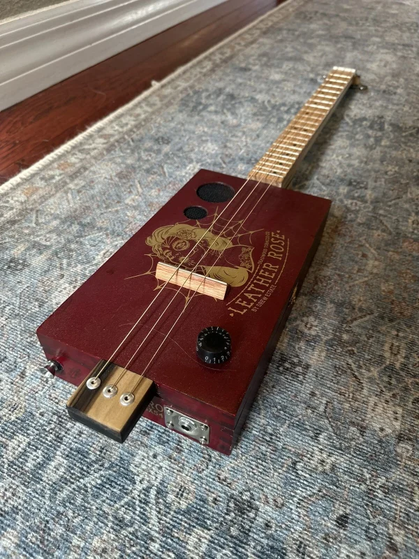 3-String Leather Rose Guitar